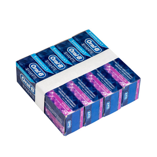 Bundling of four carton packs with Oral B toothpaste with white paper band Bundles of luxury printed caron boxes