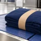 Airline laundry banding — folded blanket held by a paper band