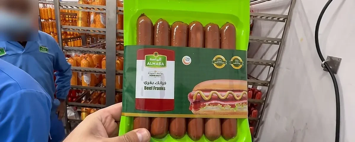 Skin packaging banding — printed film band on a beef frank skin pack
